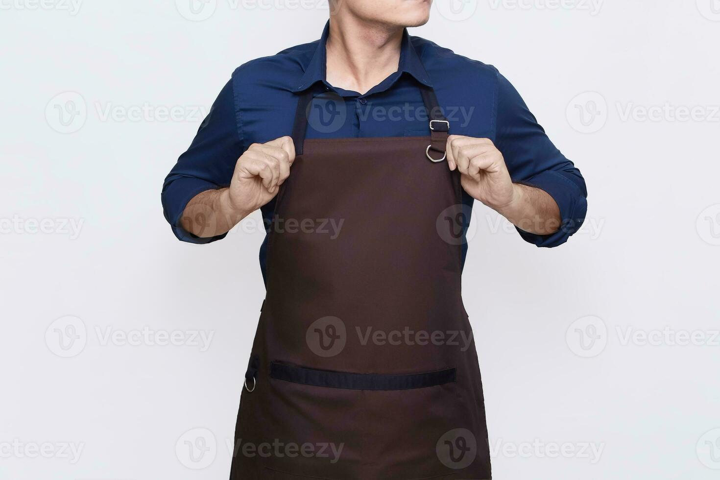 Asian Man wearing Apron in casual stylish clothing, standing tall pose with both hands straightening his apron, ready to work gesture, no face isolated white background photo