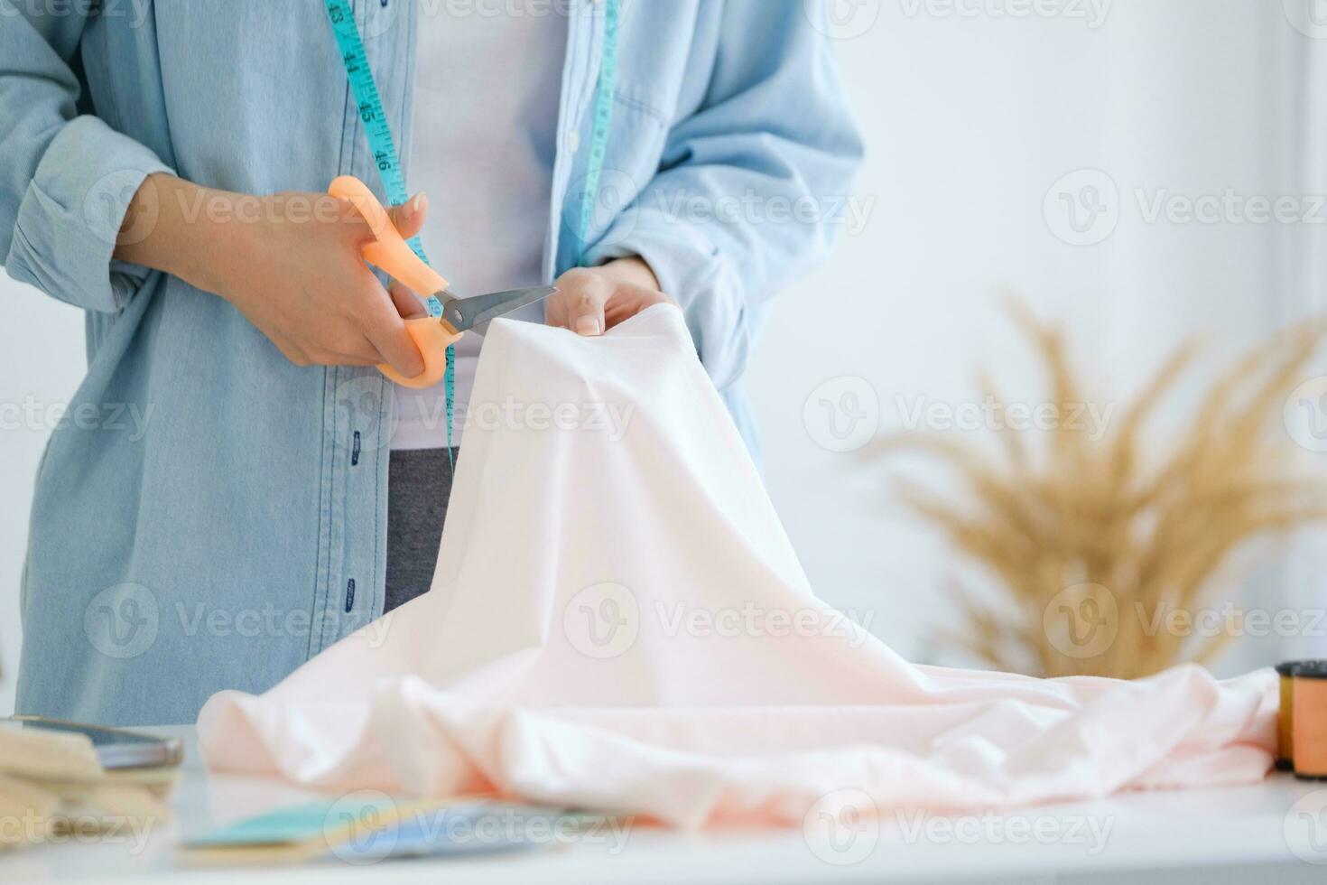 Fashion designer working in studio photo