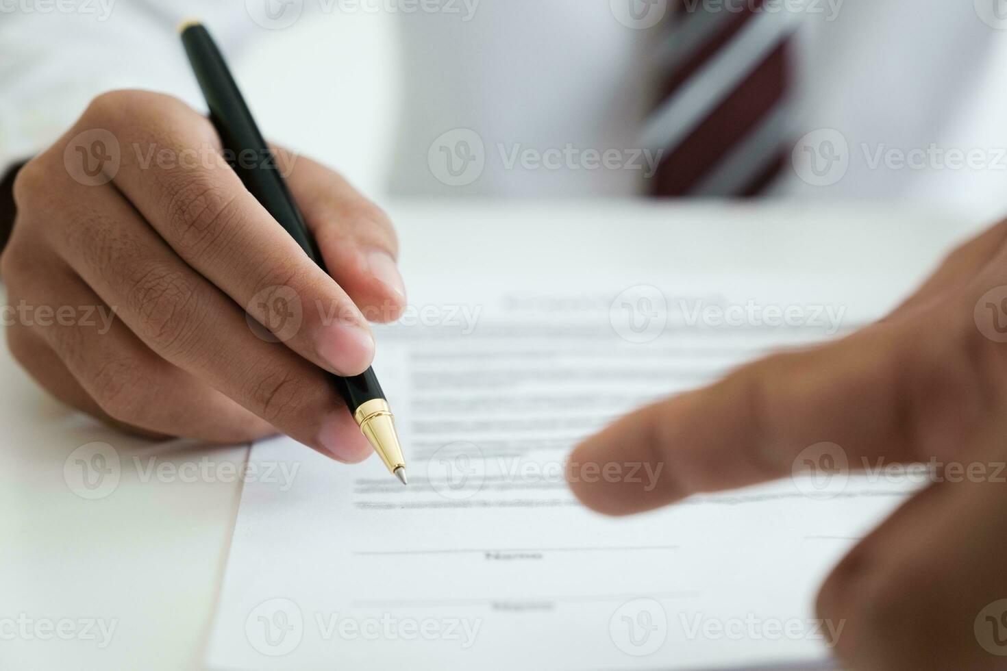 Close up businessman signing contract, partnership agreement, making deal photo