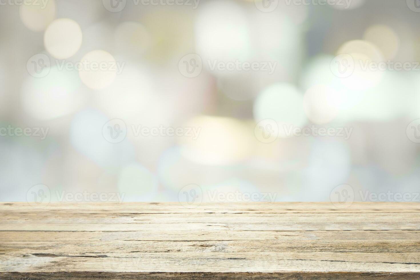 Empty wooden table for present product on bokeh blur background image. photo