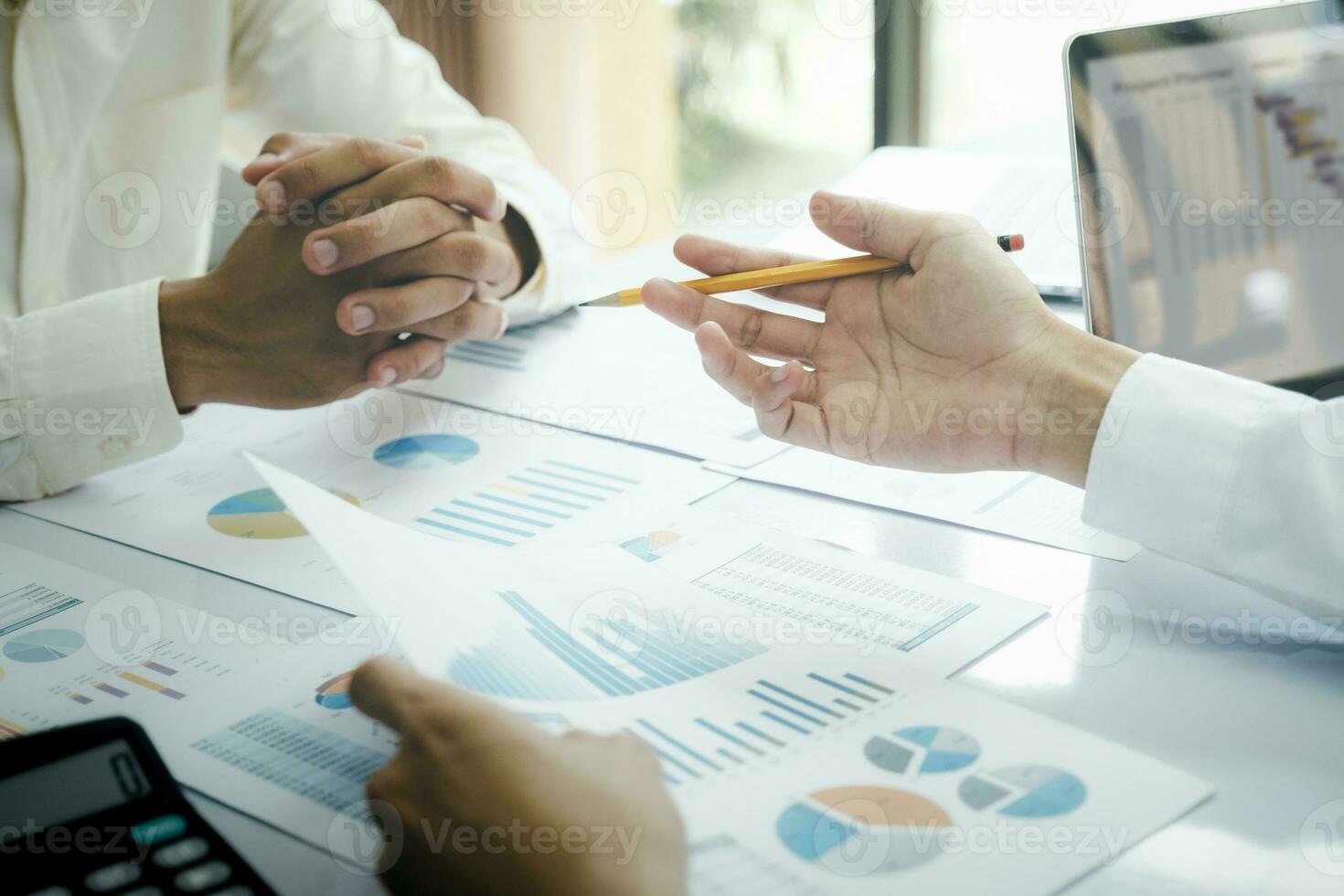 Startup asian business teamwork concept discussing graphs showing the results. photo
