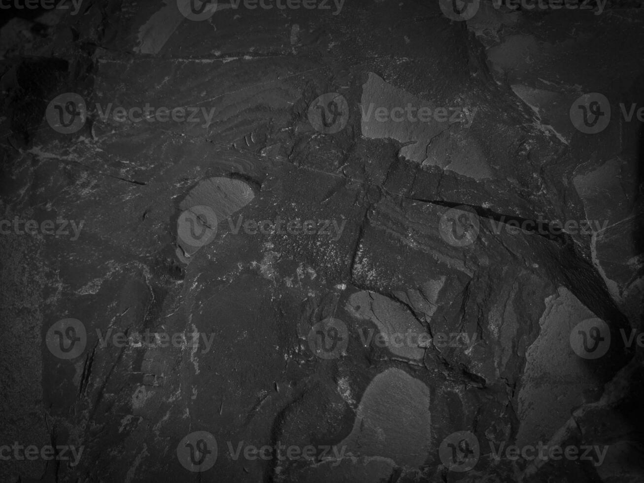 Black stone background. Long black stone texture and textured. Dirty black stone wall. Rock texture with cracks. stone tile floor texture. Old wall texture abstract natural background. photo