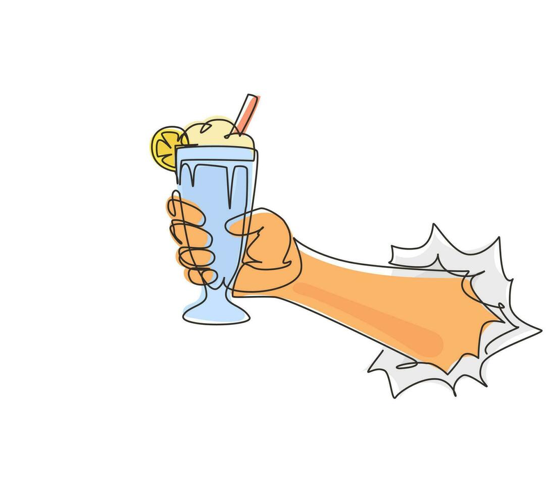 Single one line drawing hand holds glass milkshake with whipped cream through torn white paper. Cold soft drink for summer. Sweet beverage. Tasty and yummy fast food continuous line draw design vector