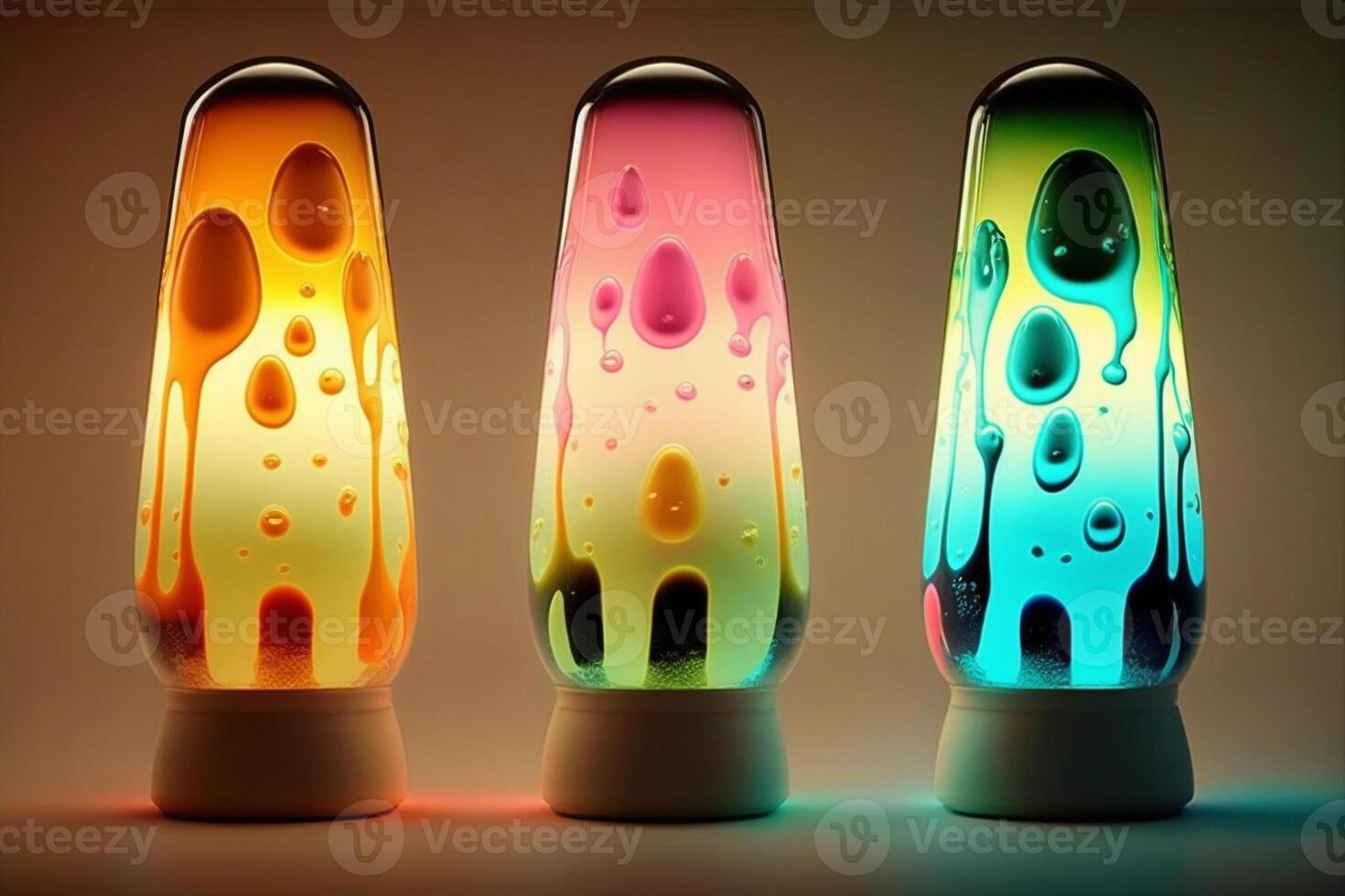 three lava lamps are lit up in different colors and shapes. . photo