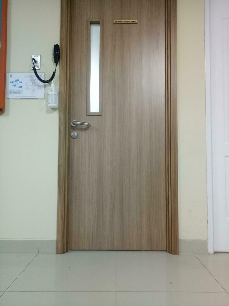 photo of an elegant wooden door in a hospital