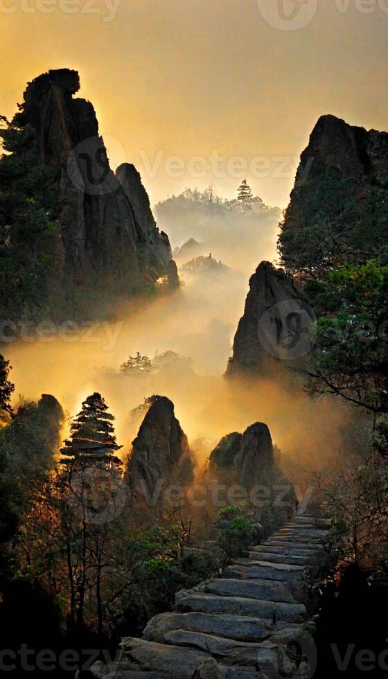 stone path leads up to the top of a mountain. . photo