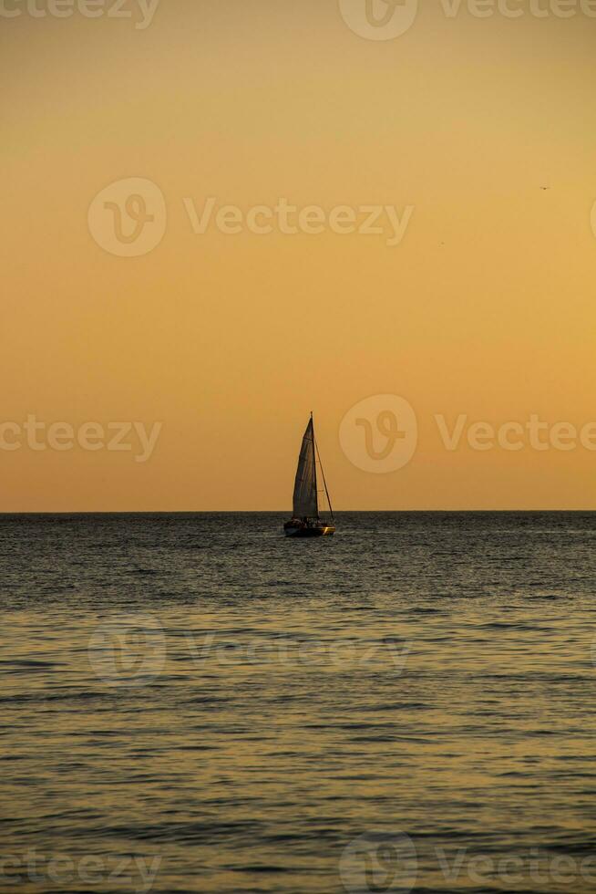 Sailing Yacht In The Sea At Sunset. Black Sea. photo