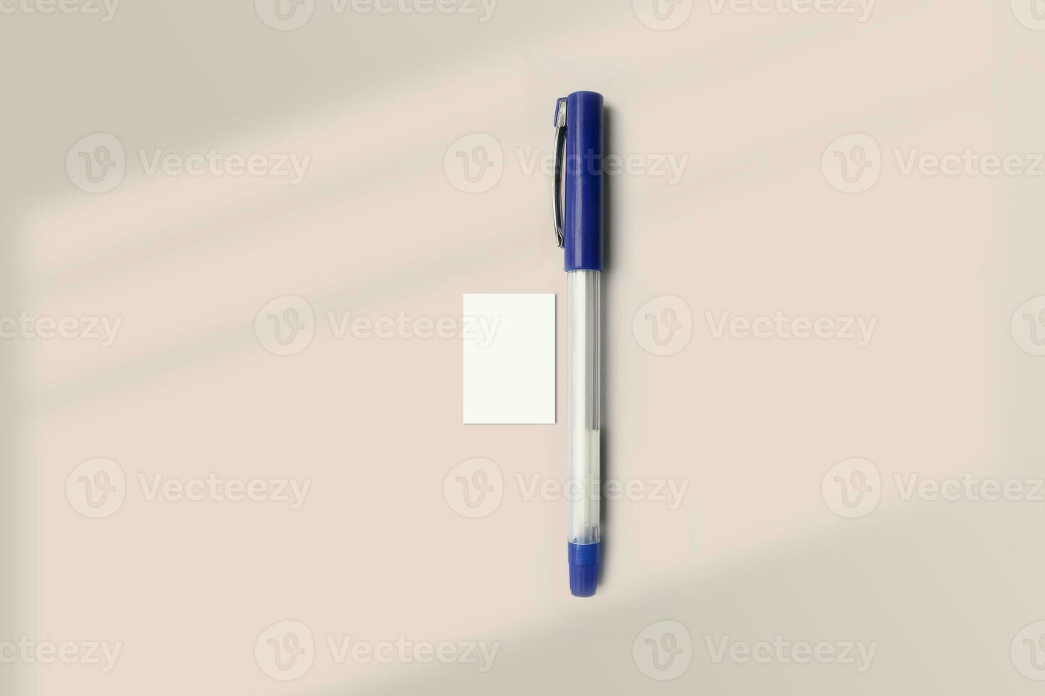 Realistic A10 paper flatlay mockup with a pen. Portrait A10 International Paper Size mockup top view. Simple, clean, modern, minimal super small paper mock up flat lay concept photo