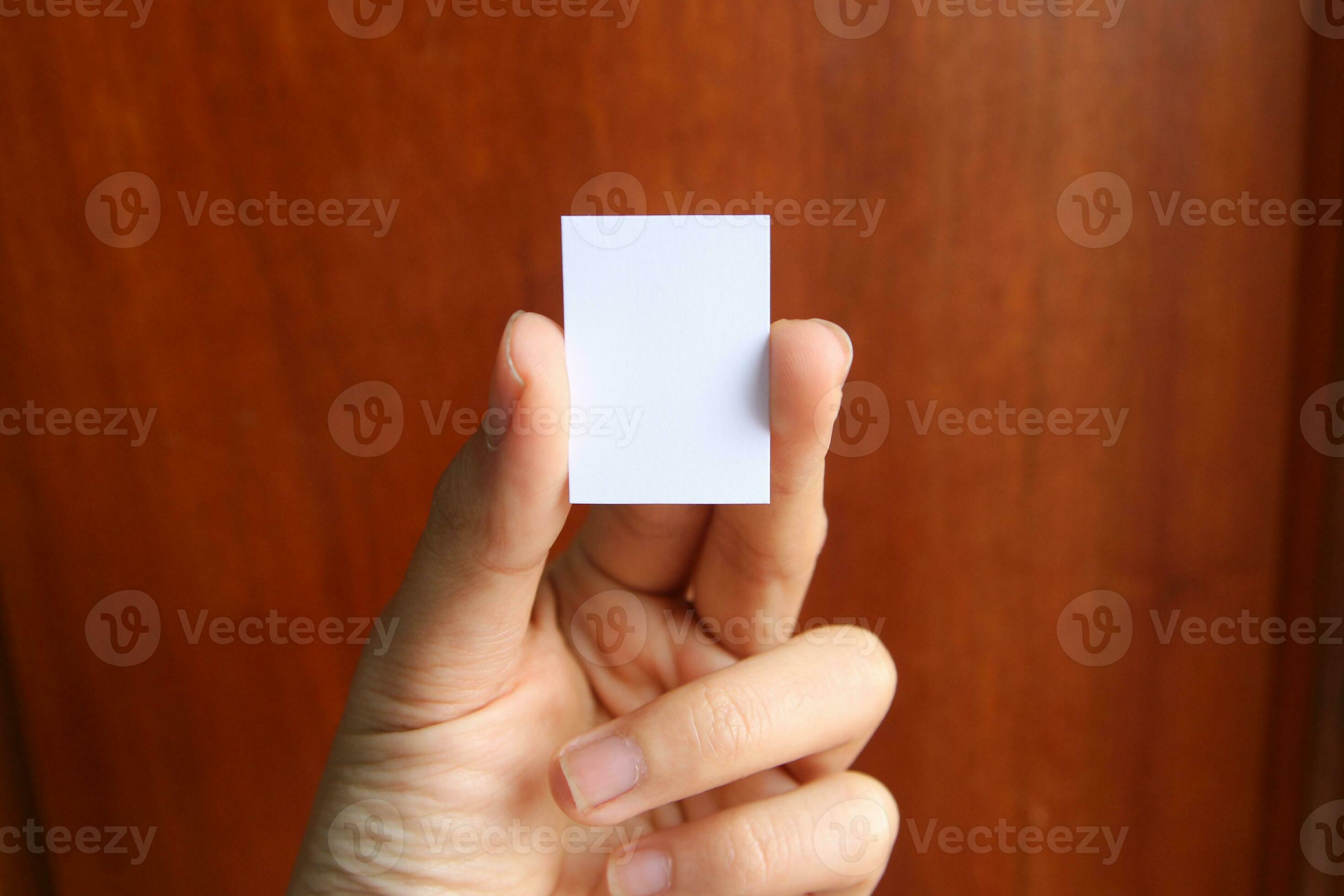 Hands Holding Square Paper Mockup Stock Template