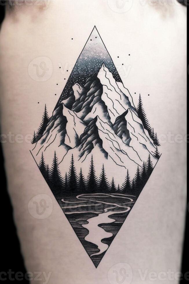 man with a mountain tattoo on his back. . photo