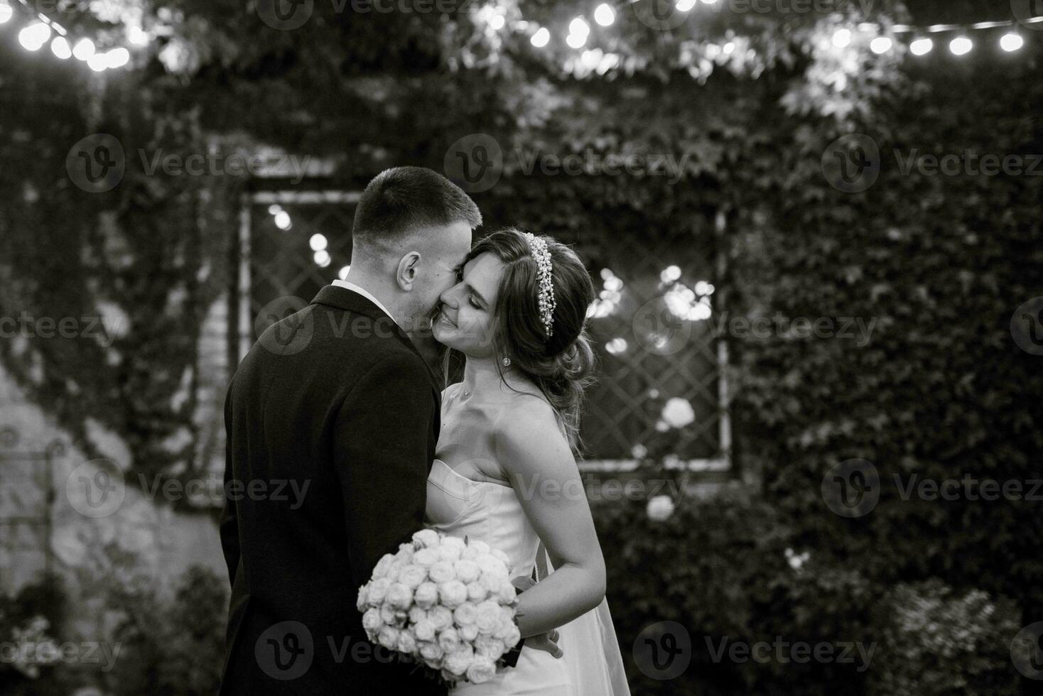 portrait of a young couple of bride and groom on their wedding day photo