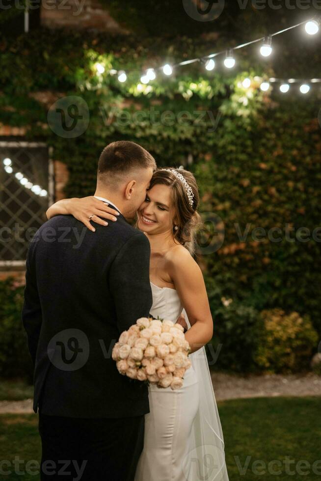 portrait of a young couple of bride and groom on their wedding day photo