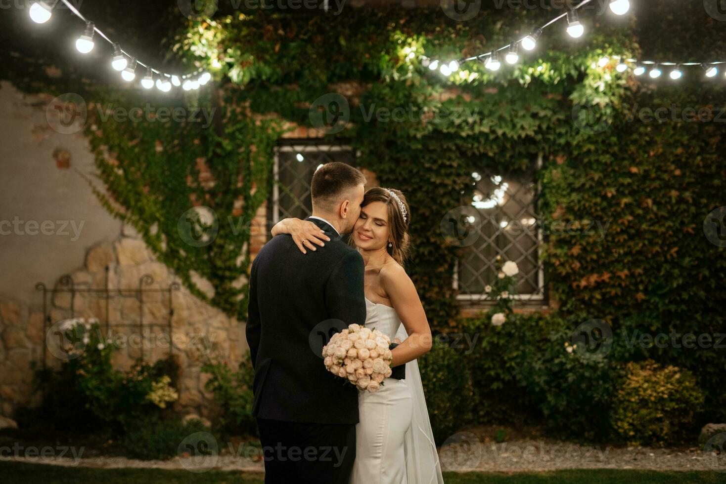 portrait of a young couple of bride and groom on their wedding day photo