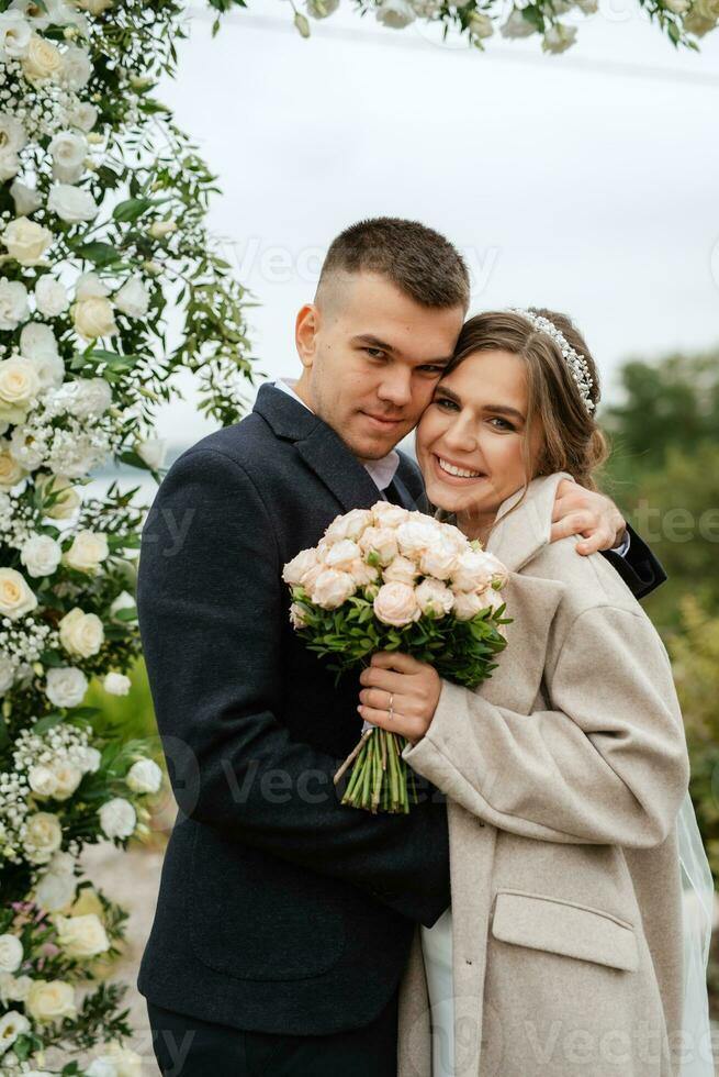 wedding ceremony of the newlyweds in a country cottage photo