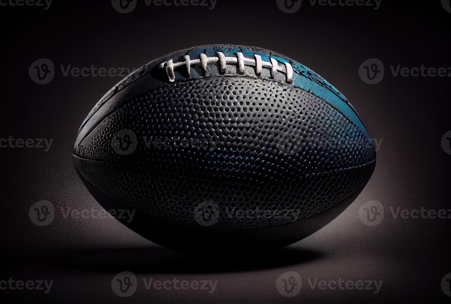 American football ball in the dark with lighting background. Sport and athlete concept. photo