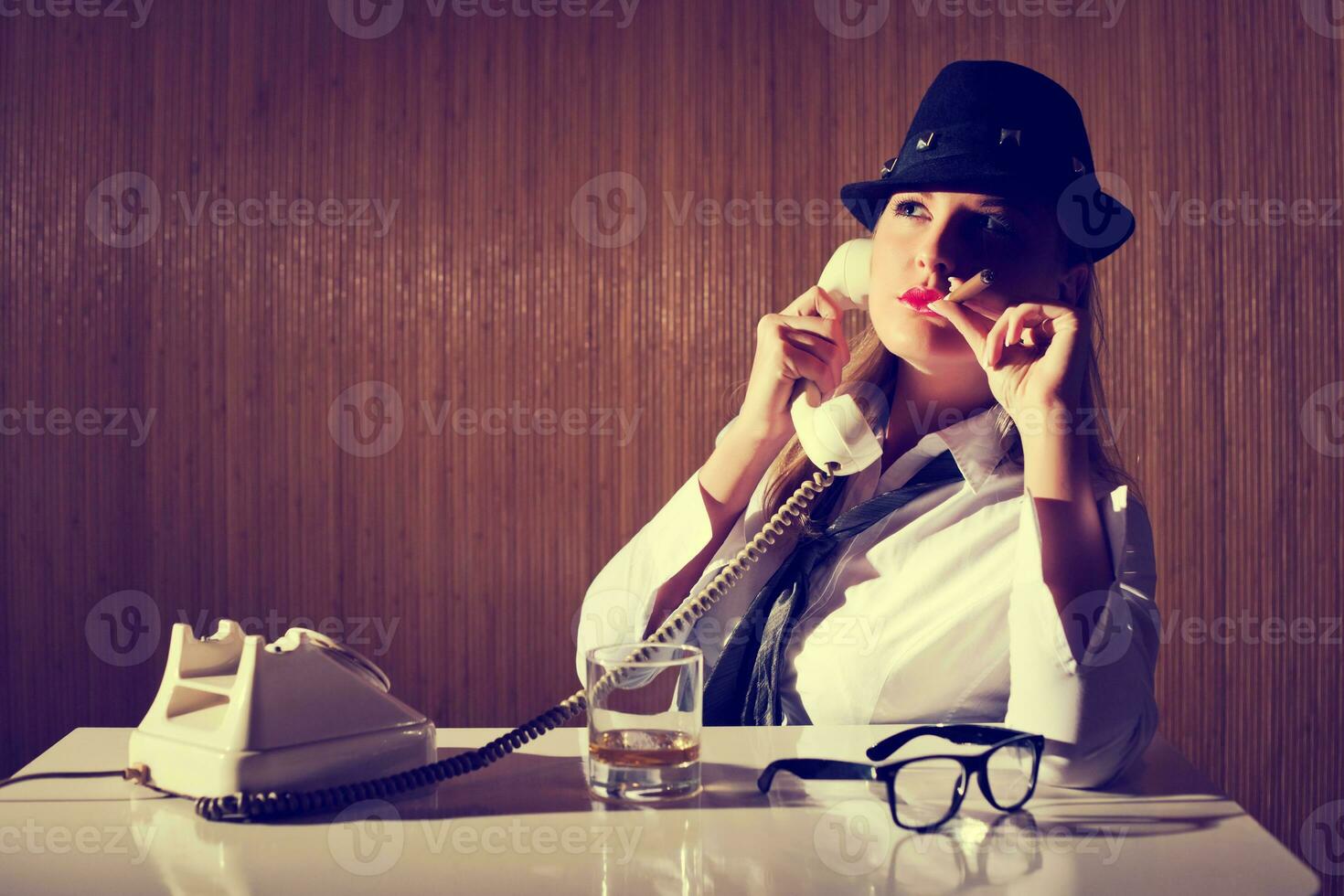 A woman talking at the phone photo