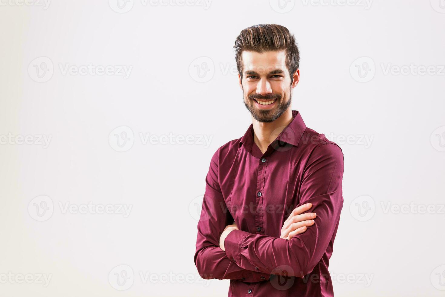 A happy man in a purple shirt photo