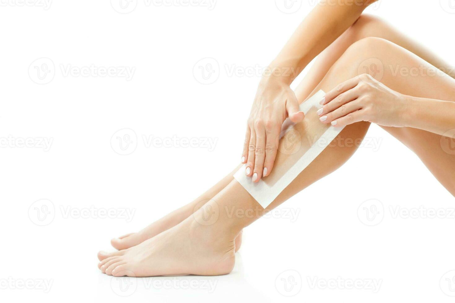 A woman taking care of her feet photo