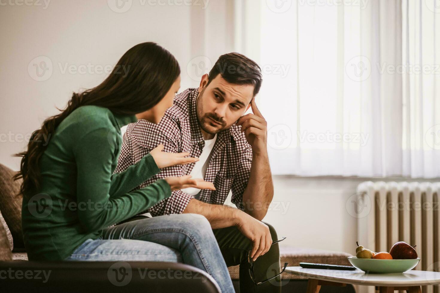 A couple arguing at home photo