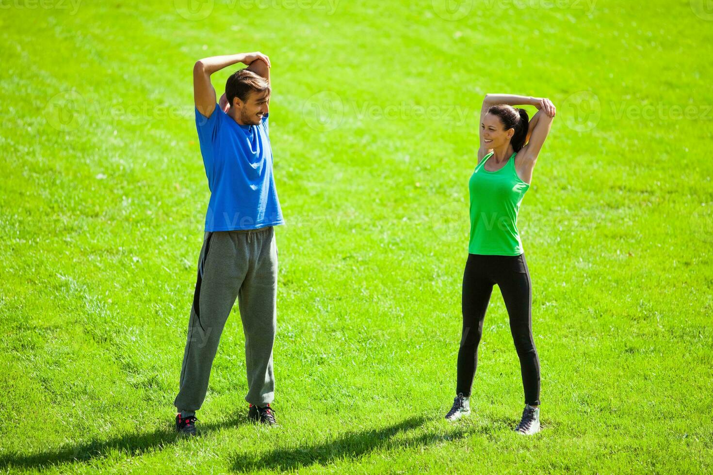 A couple doing physical exercises photo
