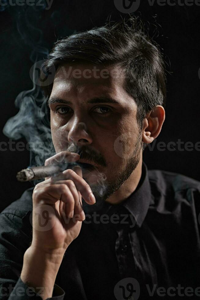 A man smoking photo