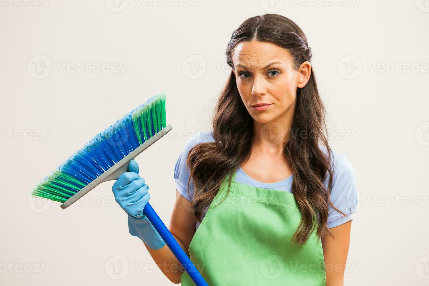 A woman who is going to clean the house photo