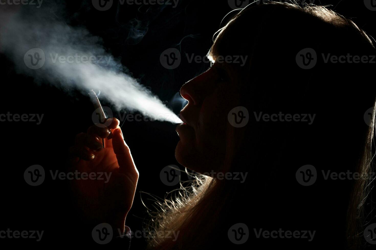 A woman smoking photo