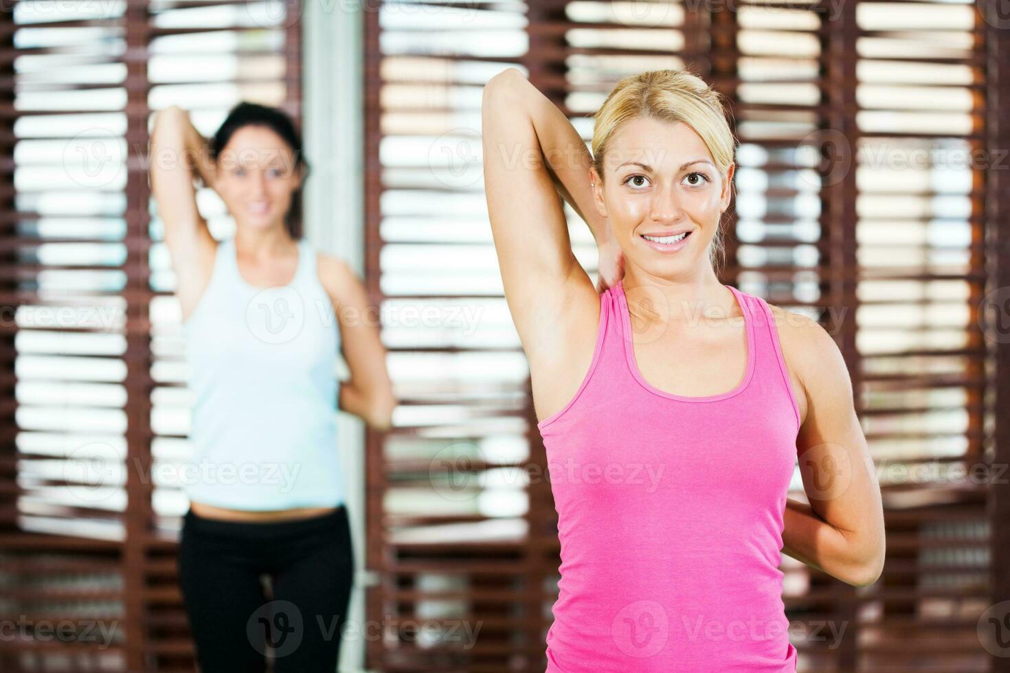 Women doing physical exercises photo