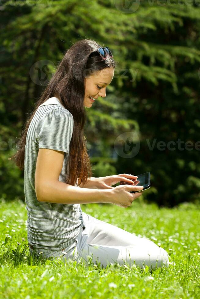 A woman spending time outdoors photo