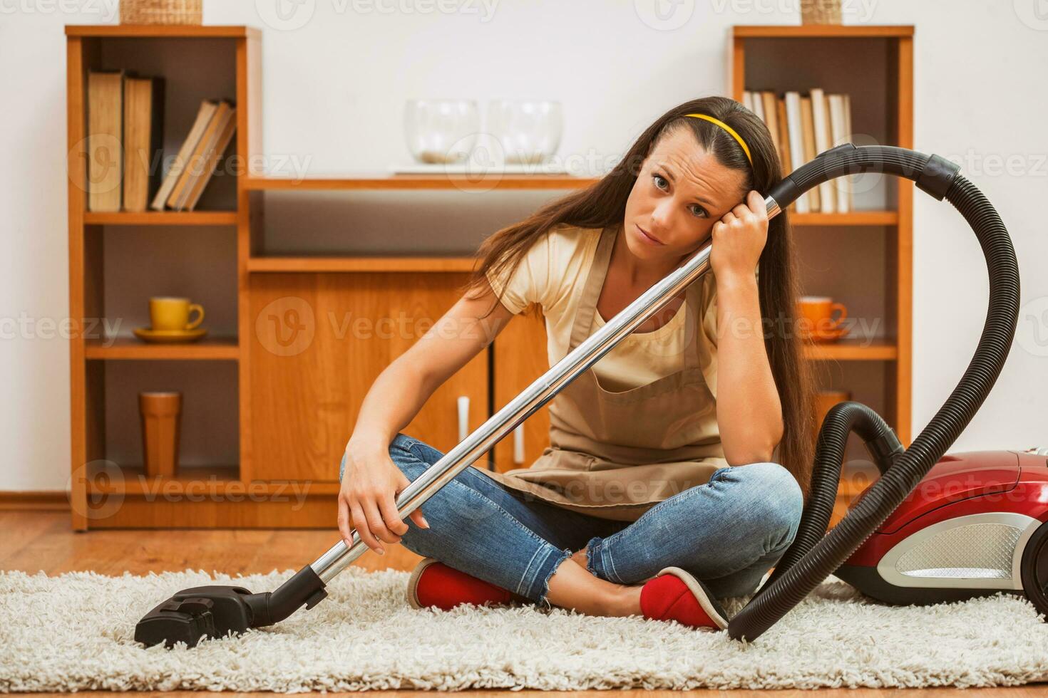 A woman cleaning the house photo