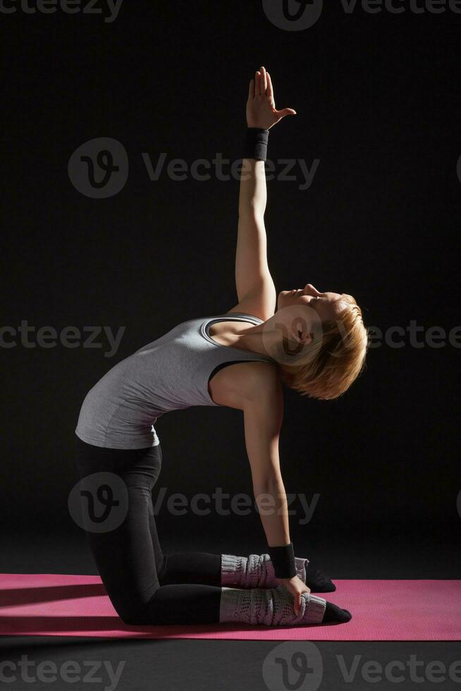 A woman doing exercises photo