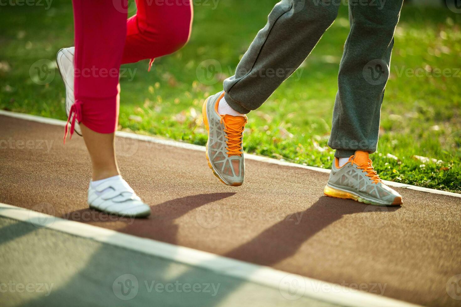 Friends doing physical exercises photo