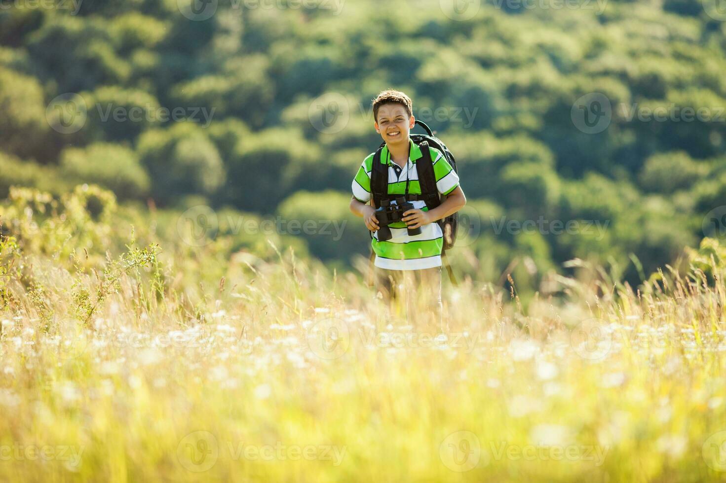 Boy spending time outdoors photo