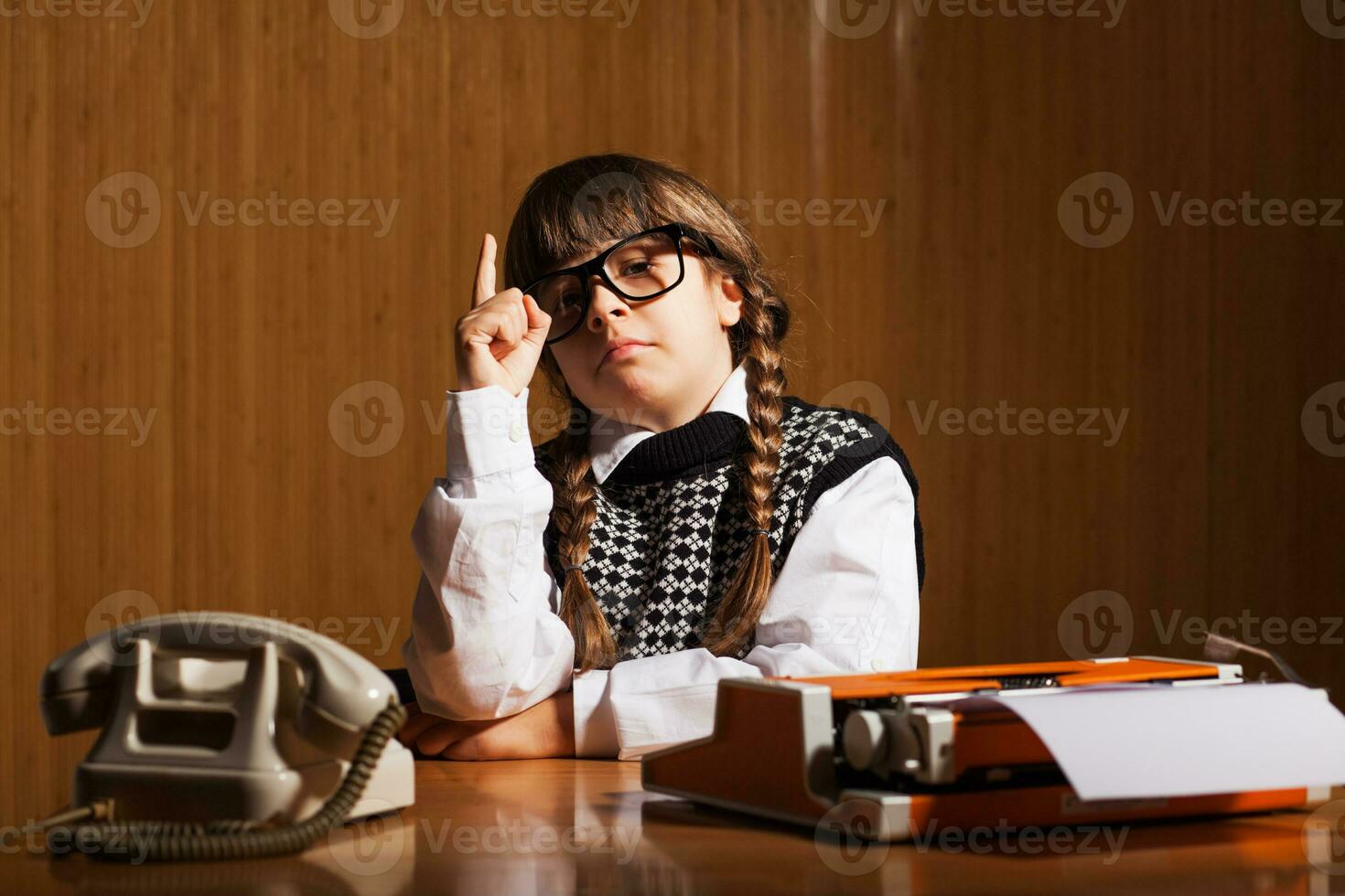 A girl who plays the role of a secretary photo