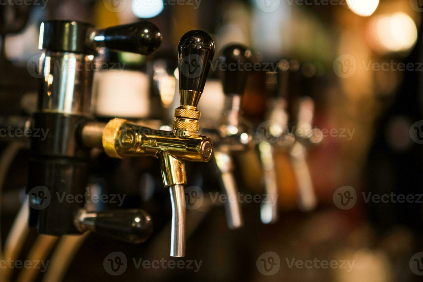 Close up of beer taps photo