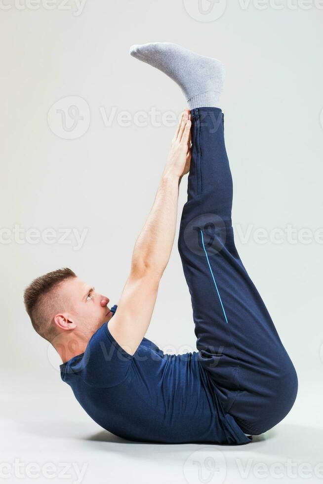 A man doing physical exercises photo