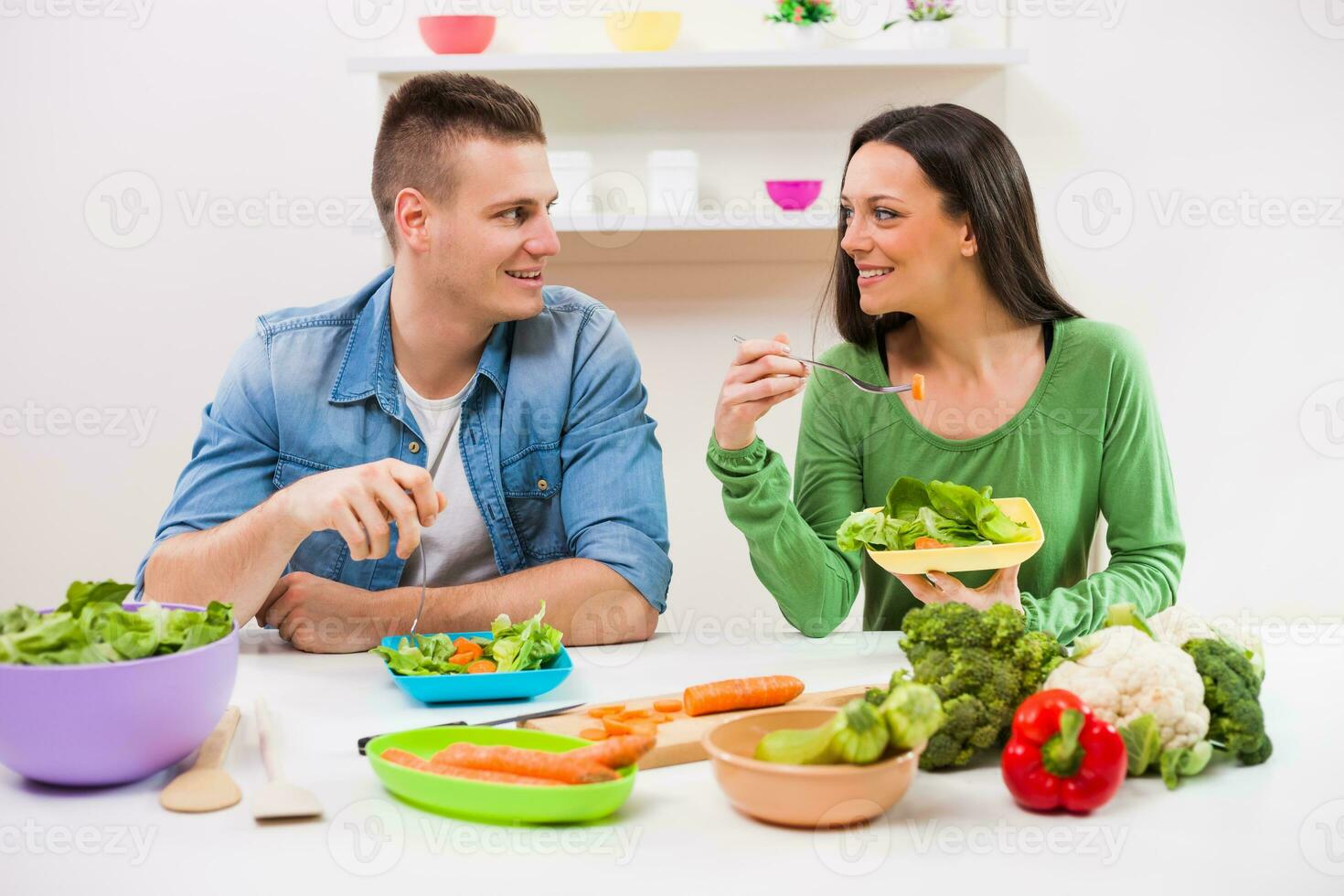 A couple eating together photo