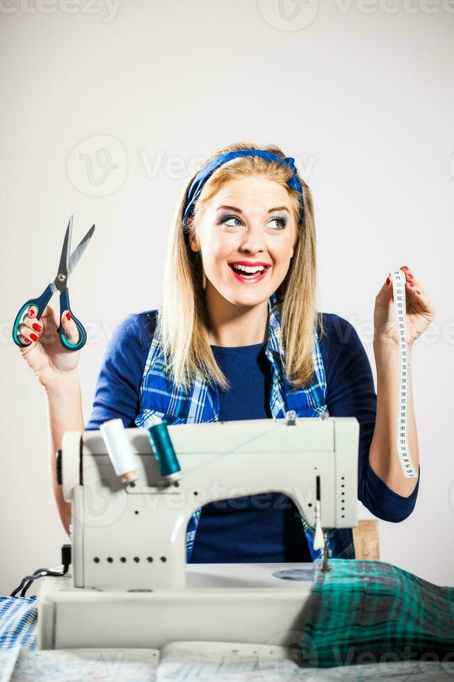 A female seamstress 23909661 Stock Photo at Vecteezy