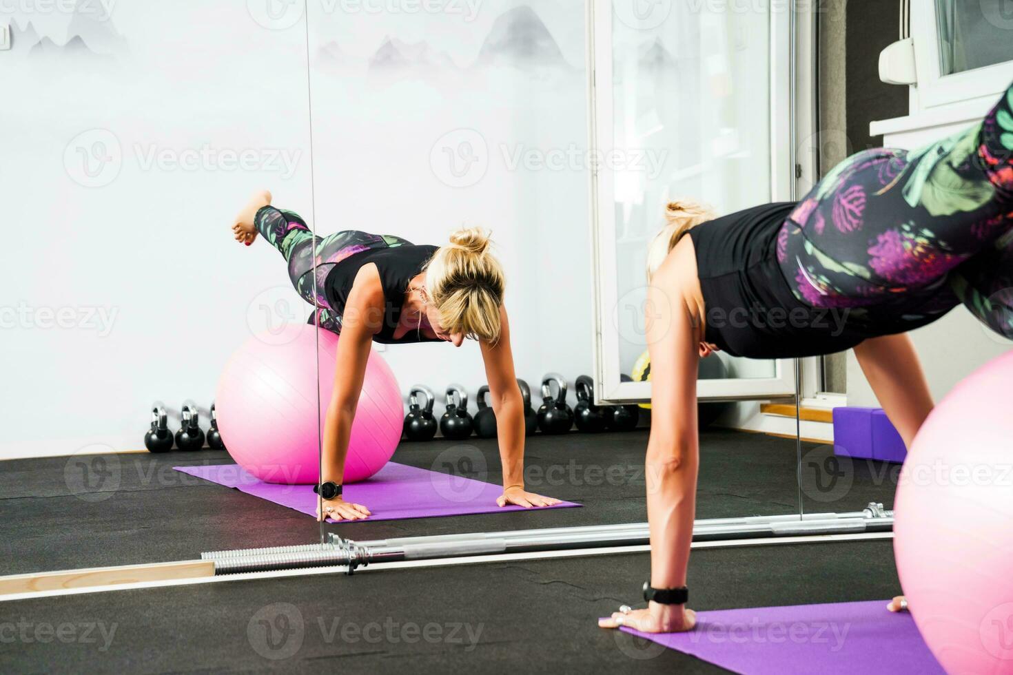 A woman doing physical exercises photo