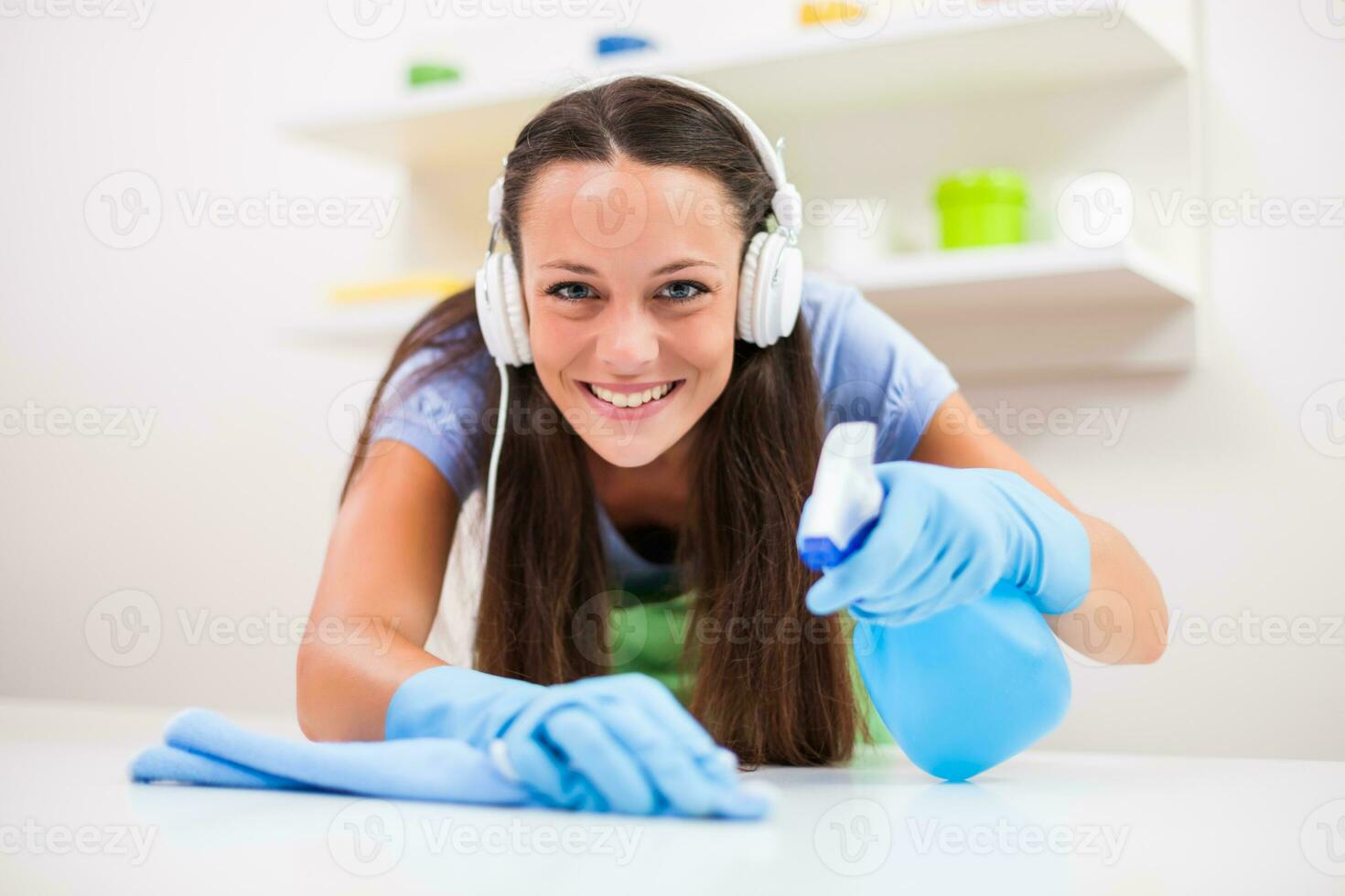 A woman cleaning the house photo