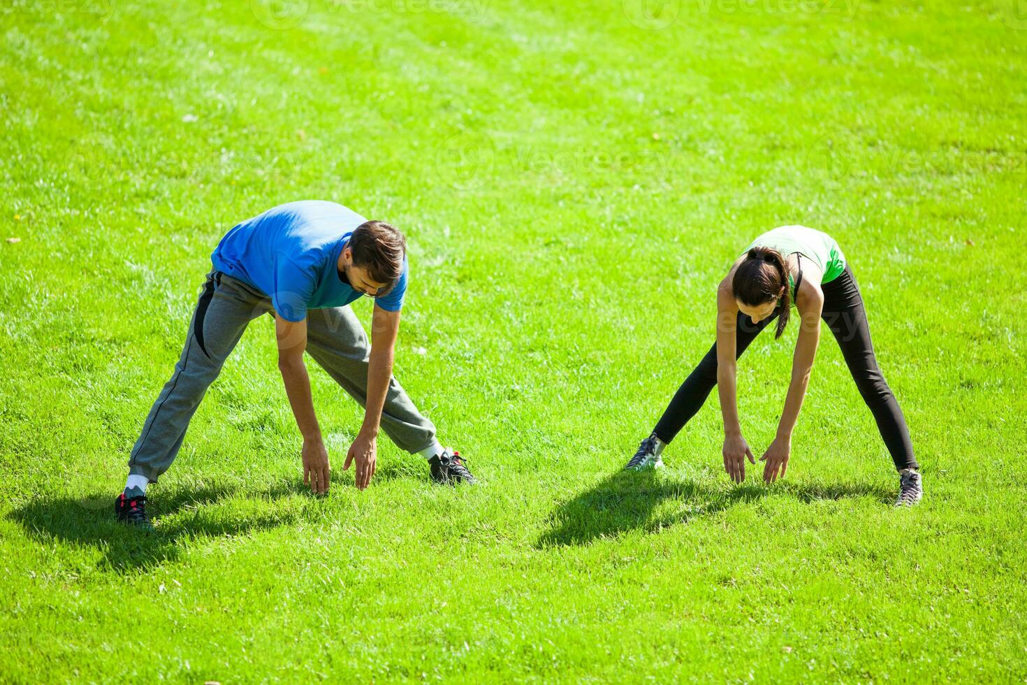 A couple doing physical exercises photo