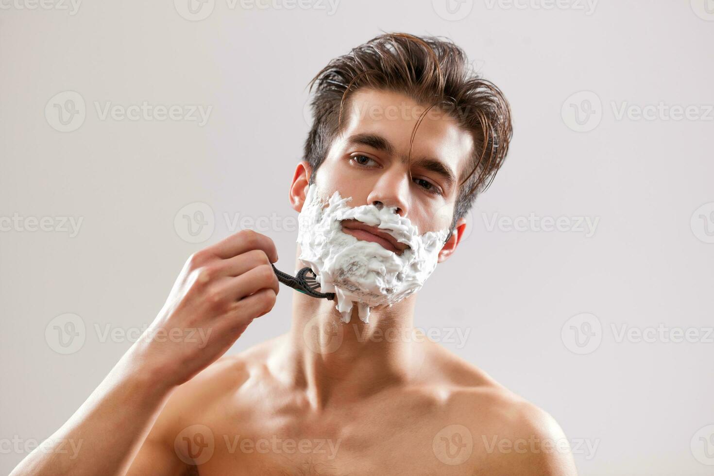 A man shaving photo