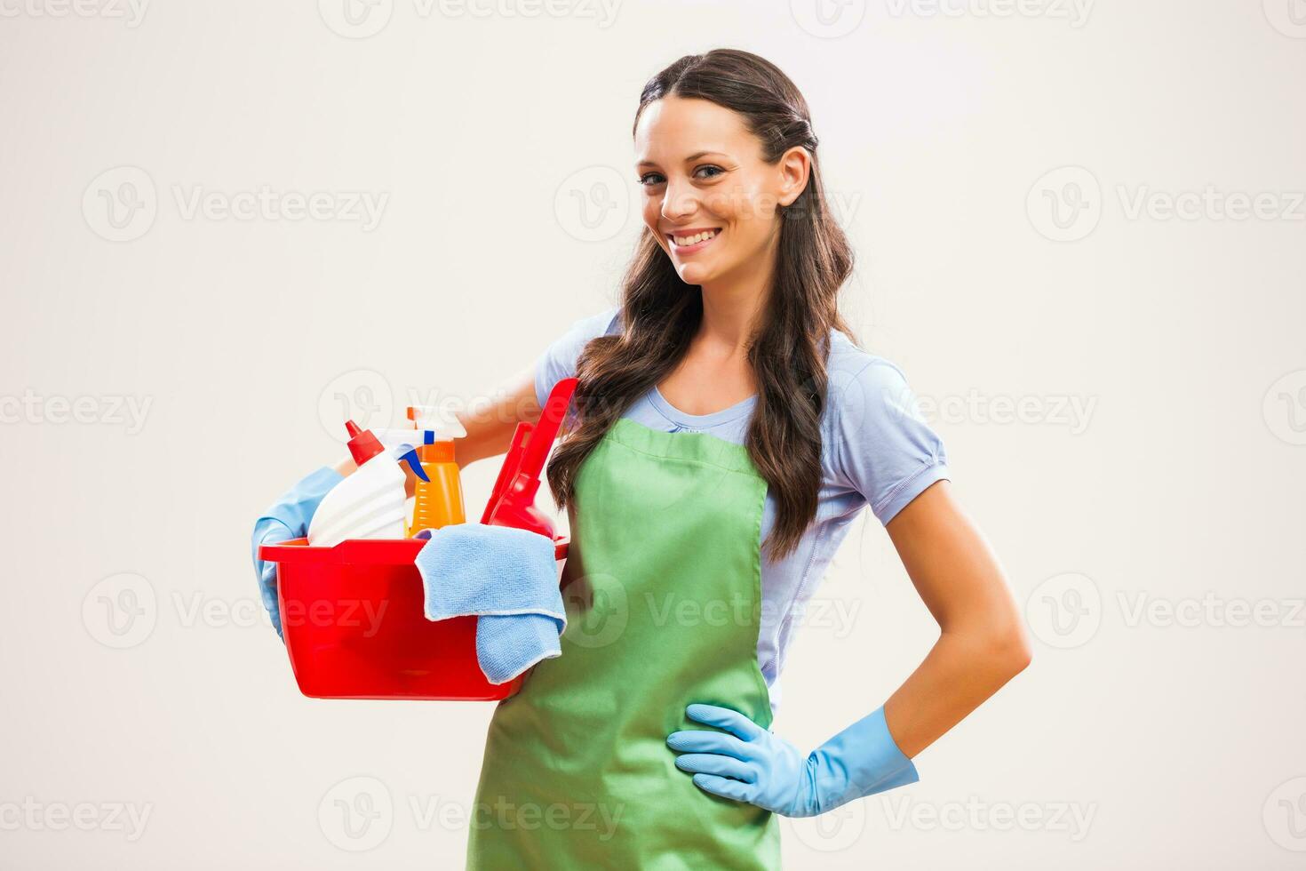 A woman who is going to clean the house photo