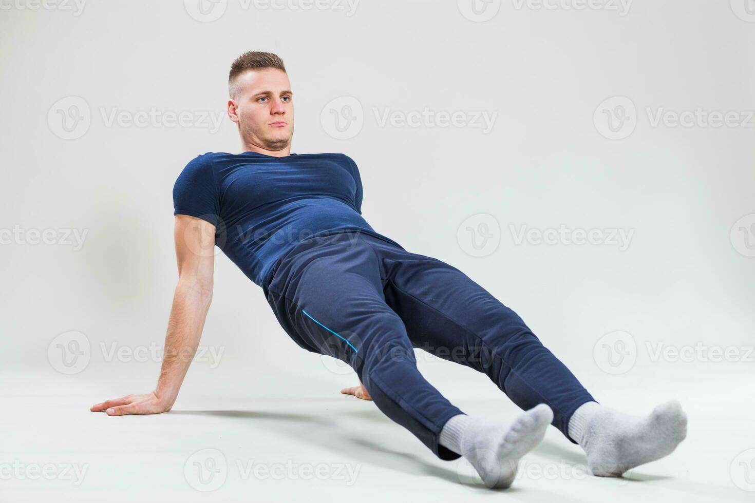 A man doing physical exercises photo