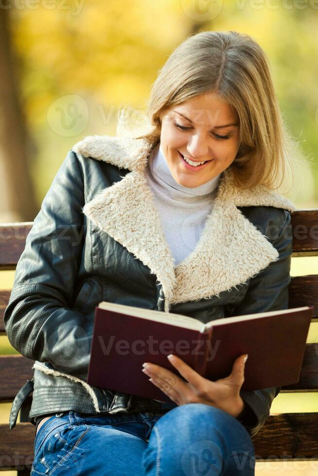 A woman reading a book photo