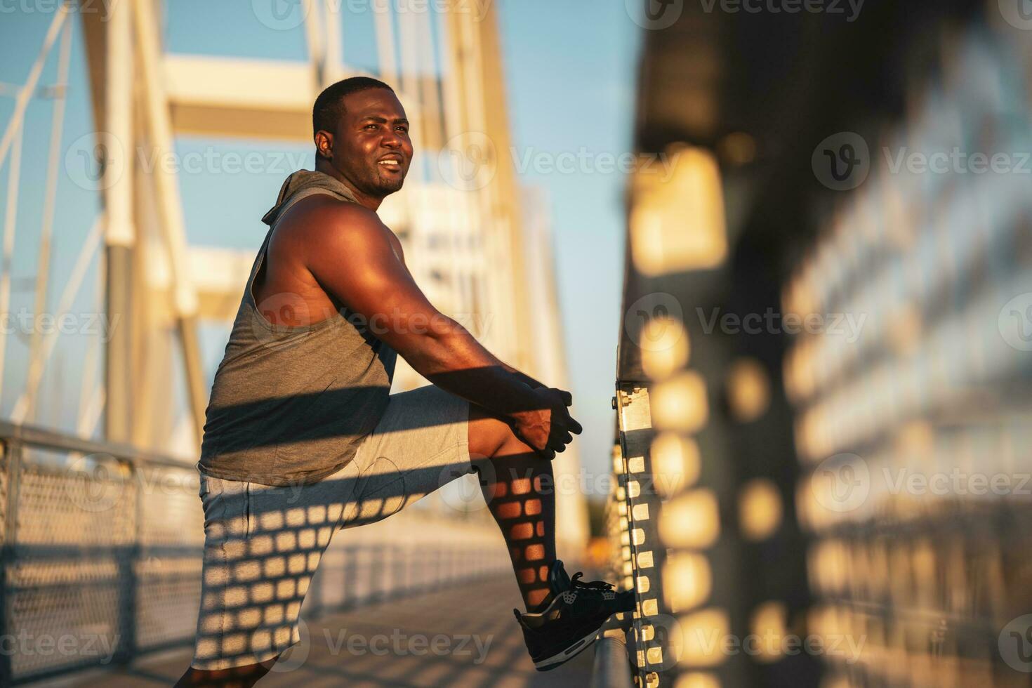 An African American man doing physical exercises photo