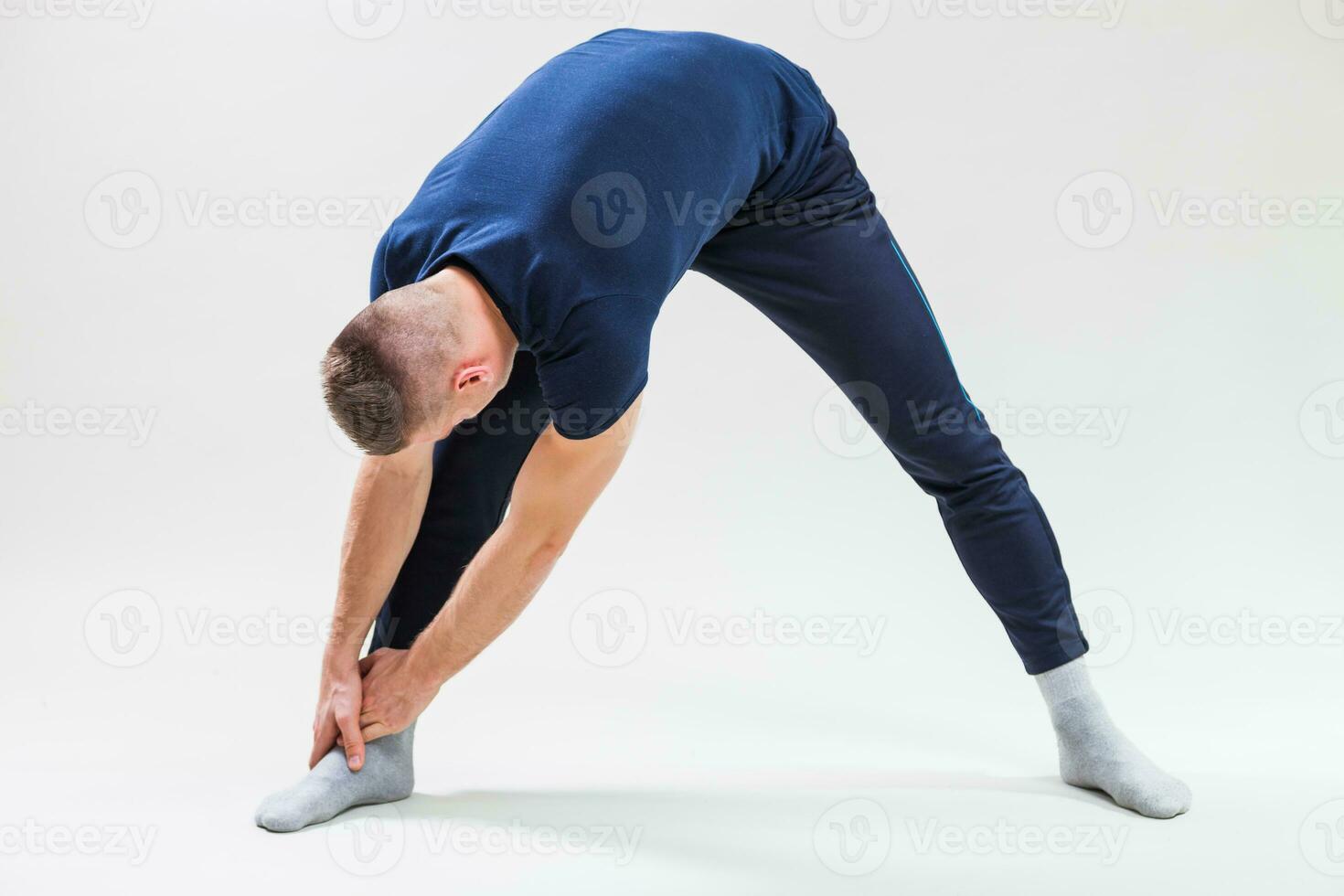 A man doing physical exercises photo