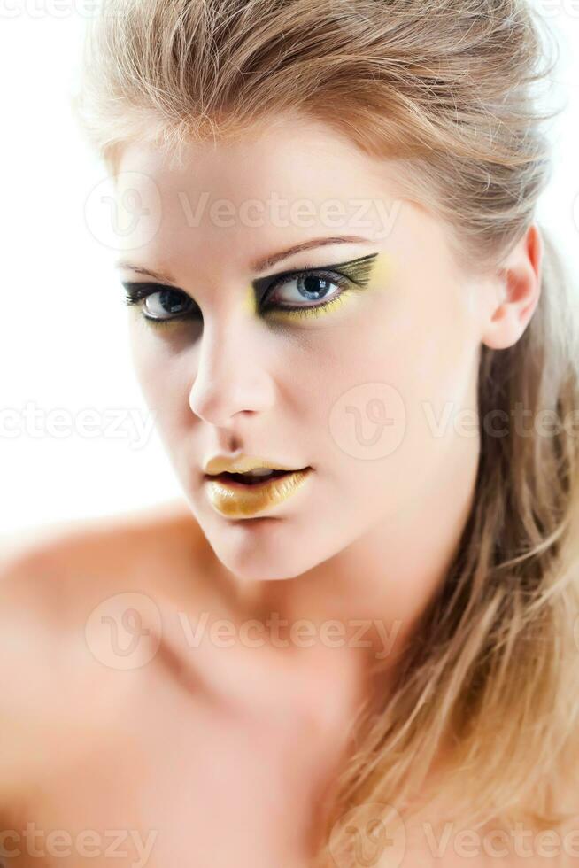 Portrait of young woman with fashion make-up photo