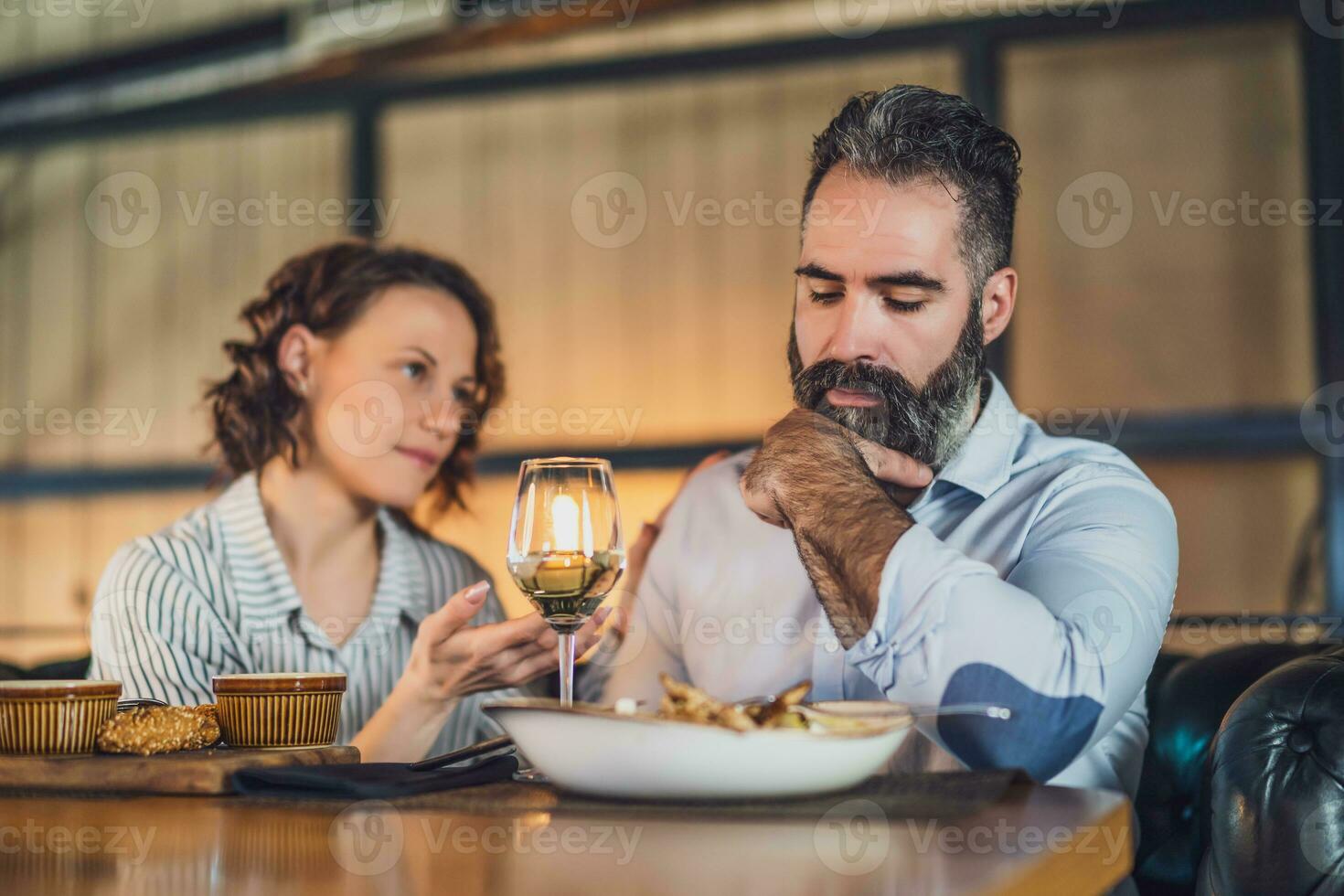 A couple having dinner photo