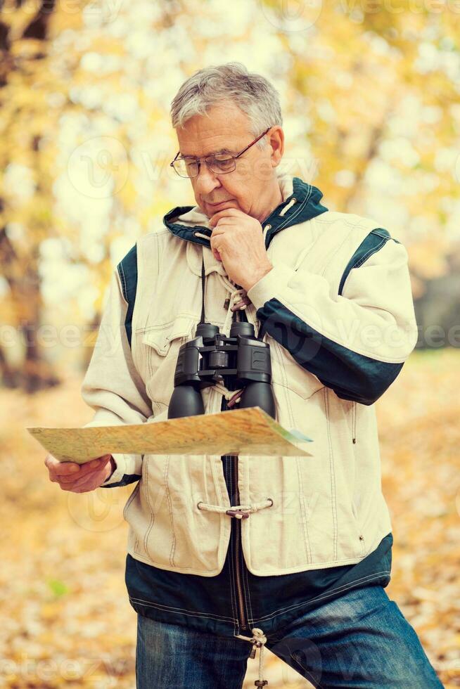 A senior man hiking photo